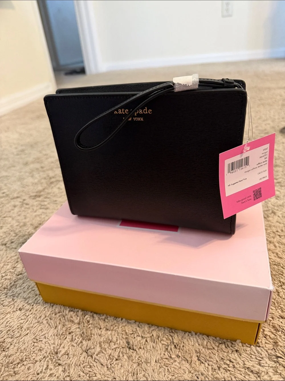 kate spade Black Leather Wristlet with Gold Logo